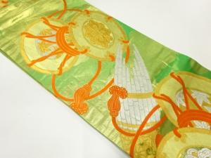 和楽器模様織出し丸帯